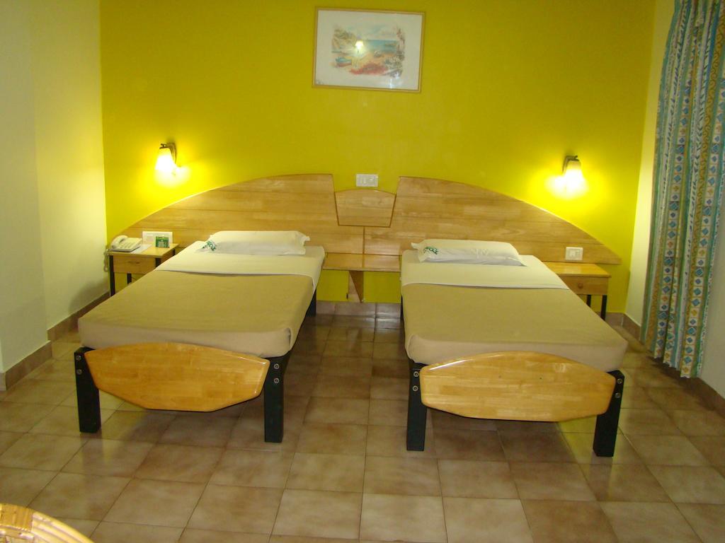 Tom'S Hotel Μπανγκαλόρ Δωμάτιο φωτογραφία